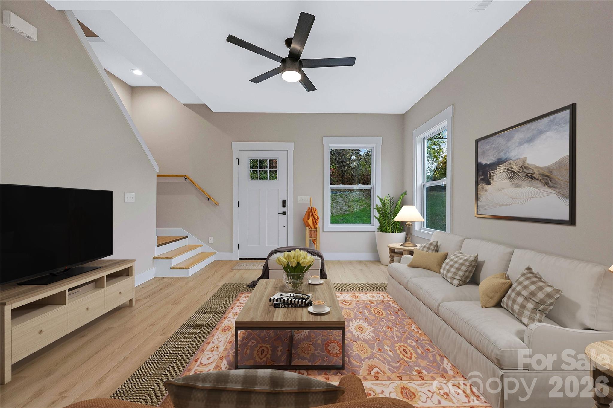 428 Hazel Mill Road Asheville, NC 28806 - Photo 7 of 46 a living room with furniture and a flat screen tv