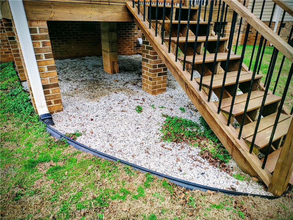 1809 Busby Road Anderson, SC 29626 - Photo 43 of 43 This exterior view highlights accessible outdoor living with a sturdy wooden staircase.