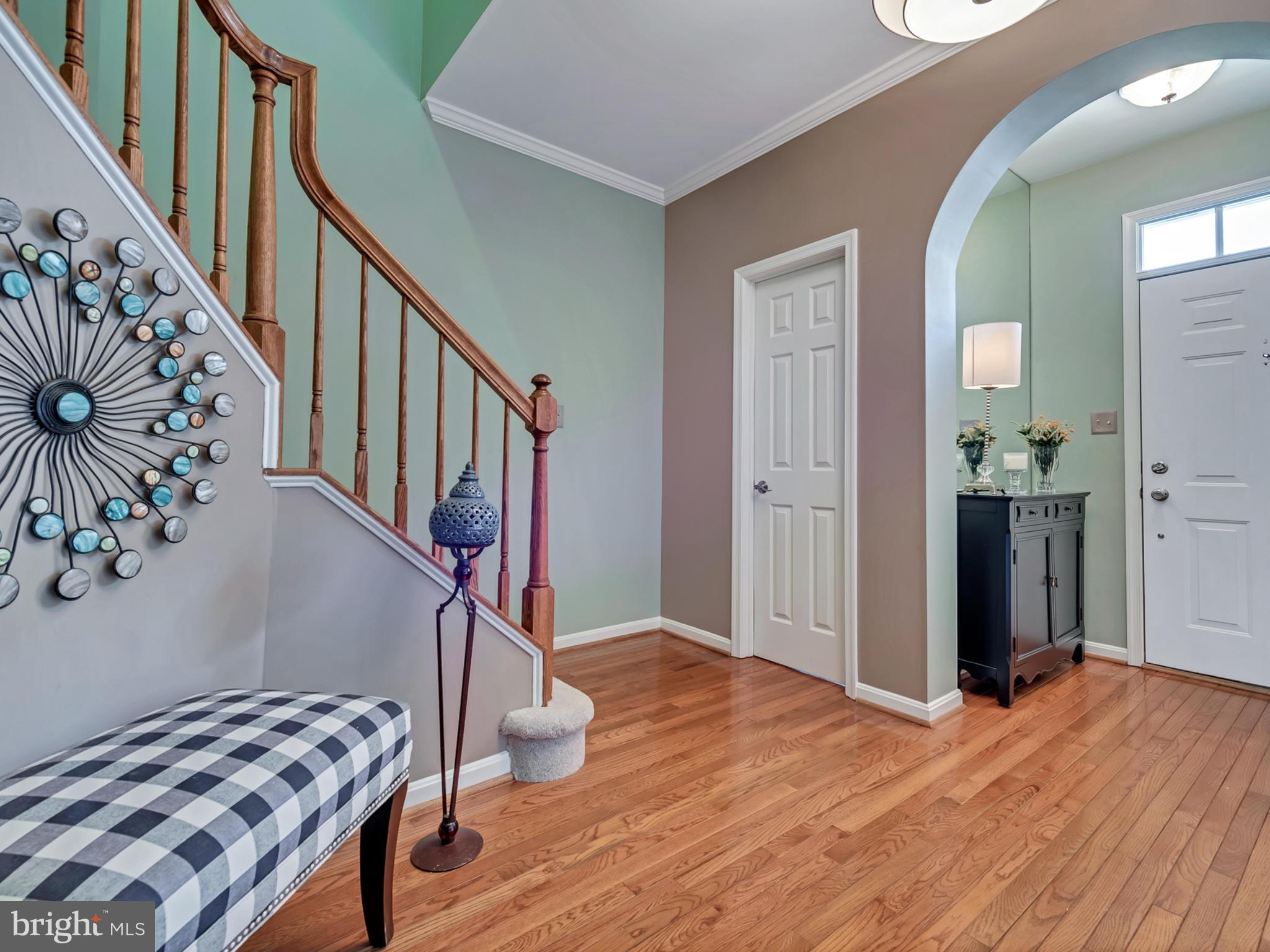 2441 Rippling Brook Road Frederick, MD 21701 - Photo 3 of 30 a view of entryway and hall with wooden floor