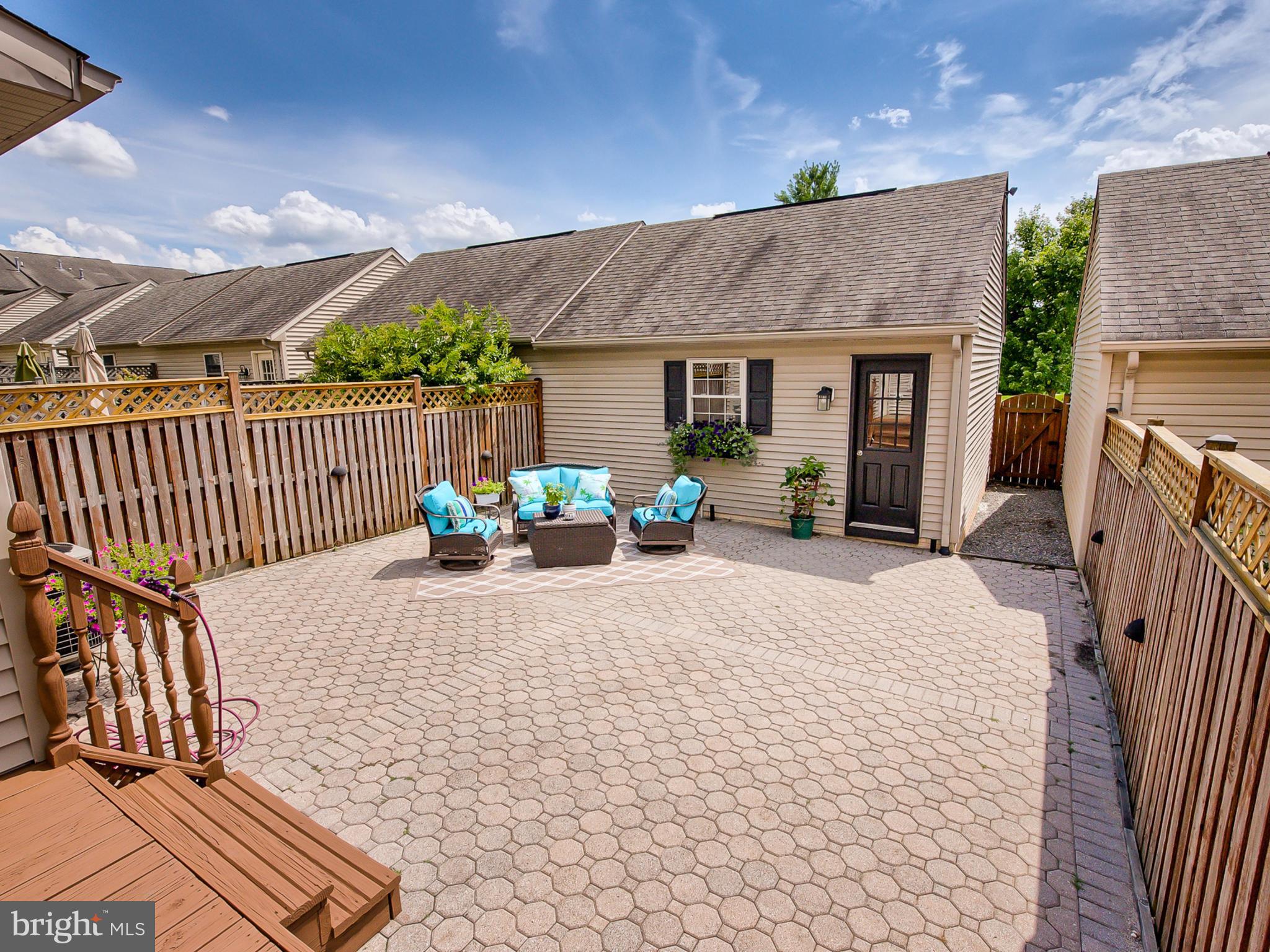 2441 Rippling Brook Road Frederick, MD 21701 - Photo 22 of 30 a view of a house with backyard and sitting area