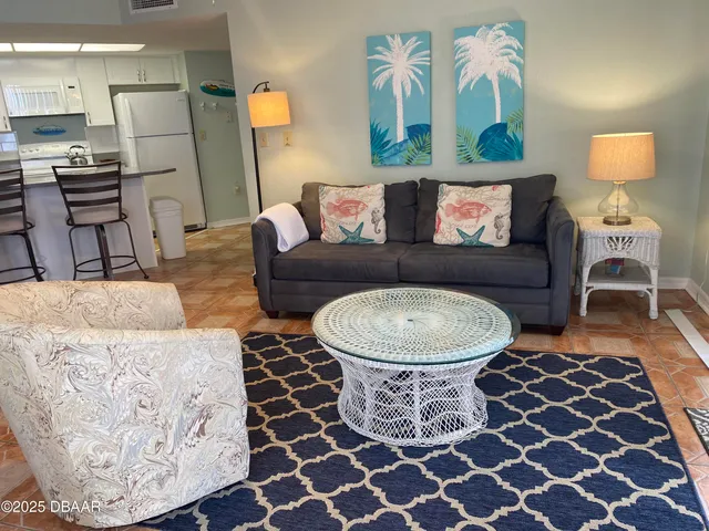 a living room with a couch and a coffee table