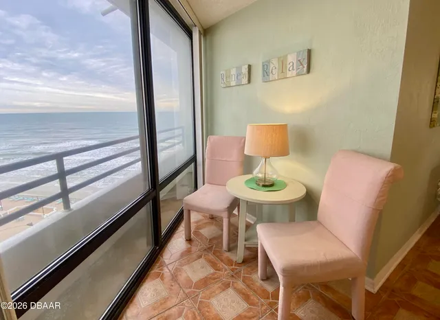 a bathroom with a toilet a sink and a mirror