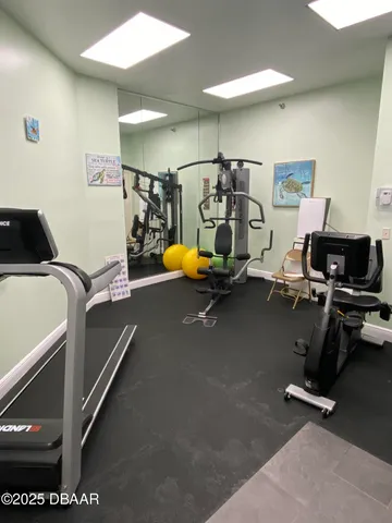 a view of a room with gym equipment