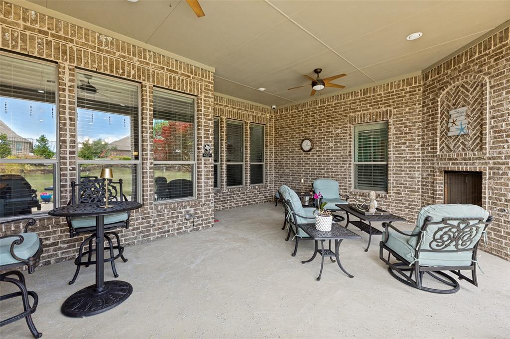506 Life Spring Drive Rockwall, TX 75087 - Photo 31 of 36 a living room with furniture and a window