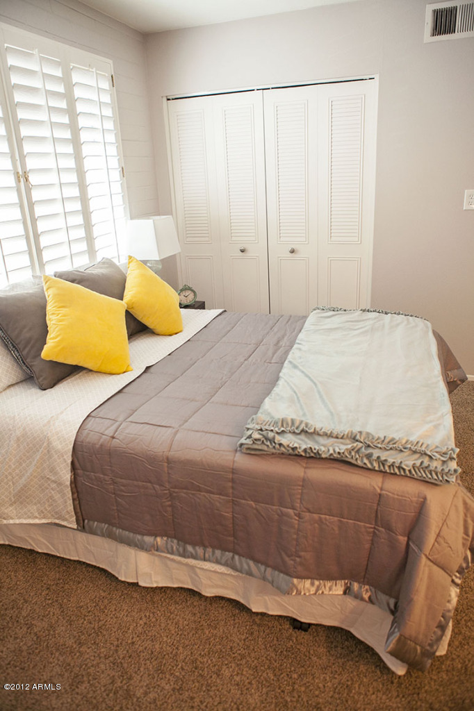 4101 East Camelback Road, Unit 16 Phoenix, AZ 85018 - Photo 14 of 27 Master bedroom with walk-in closet space