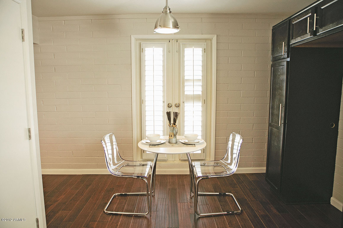 4101 East Camelback Road, Unit 16 Phoenix, AZ 85018 - Photo 6 of 27 Doors off dining that lead to private si