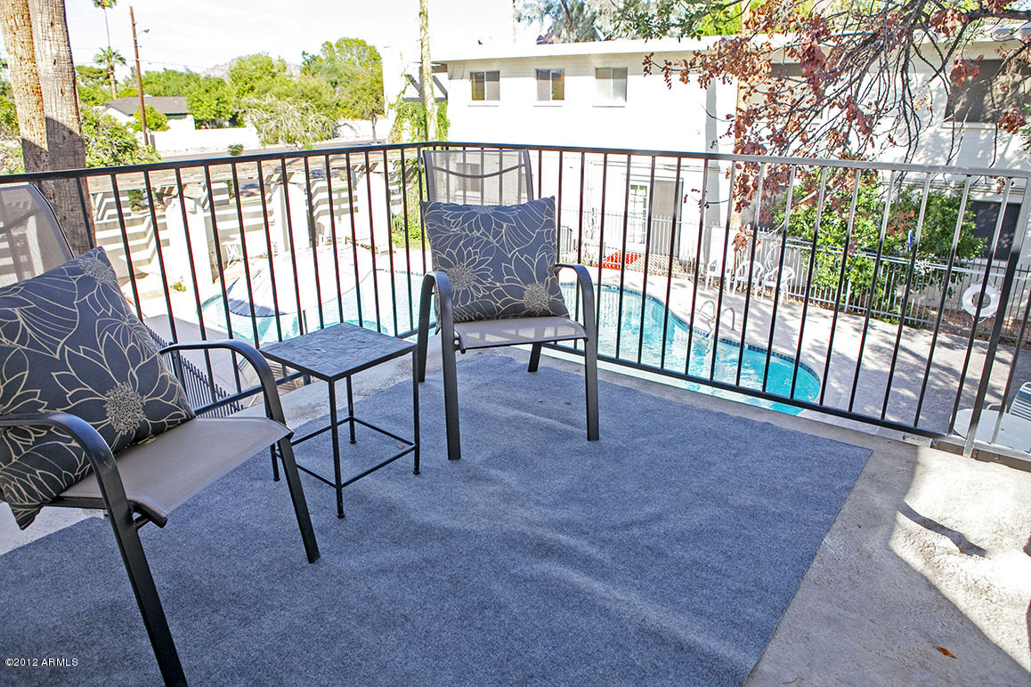 4101 East Camelback Road, Unit 16 Phoenix, AZ 85018 - Photo 7 of 27 Private side balcony overlooking the poo