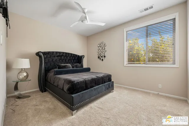 a bedroom with a bed and a closet