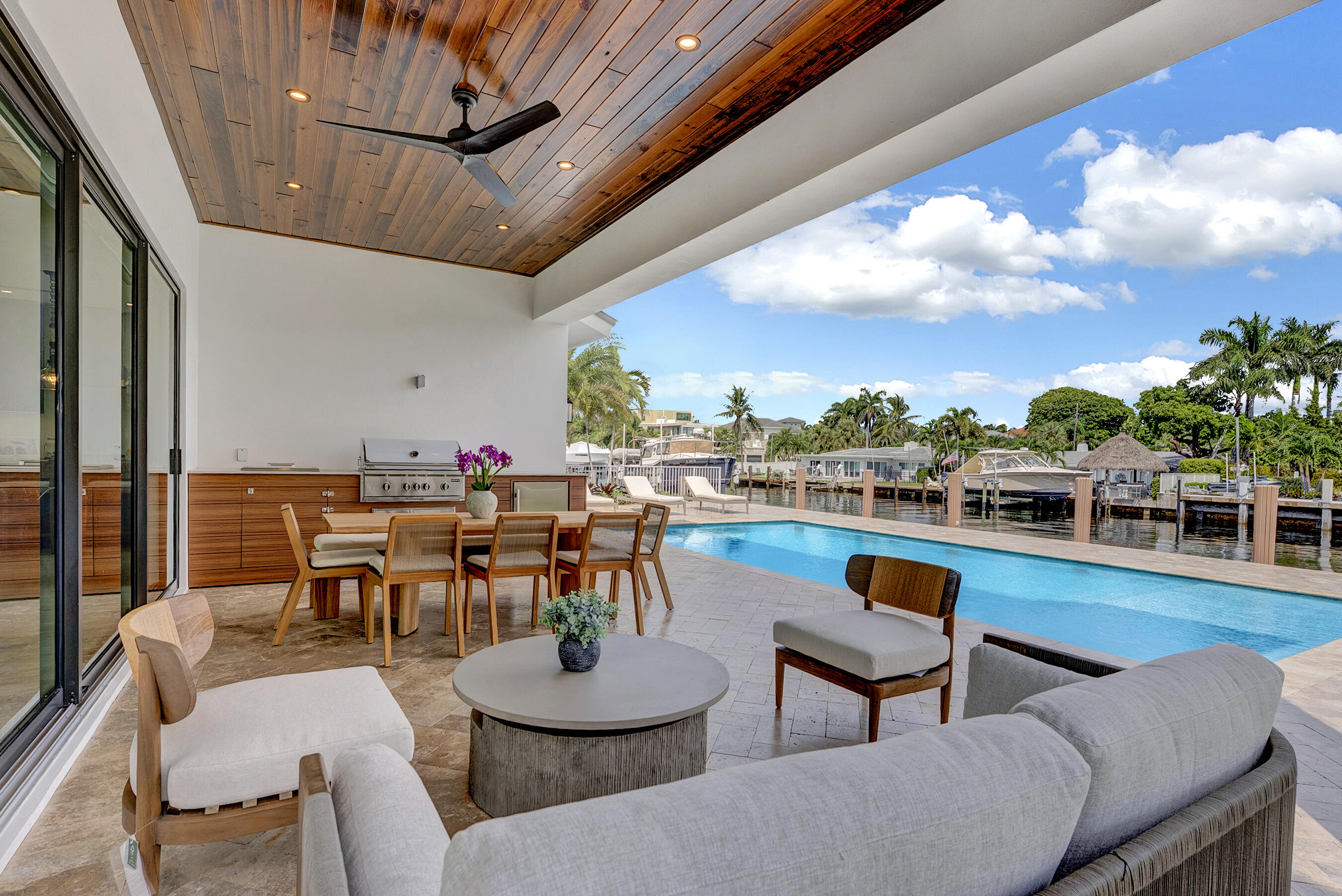 3205 Beacon Street Pompano Beach, FL 33062 - Photo 30 of 39 a dining room with furniture and a view of kitchen