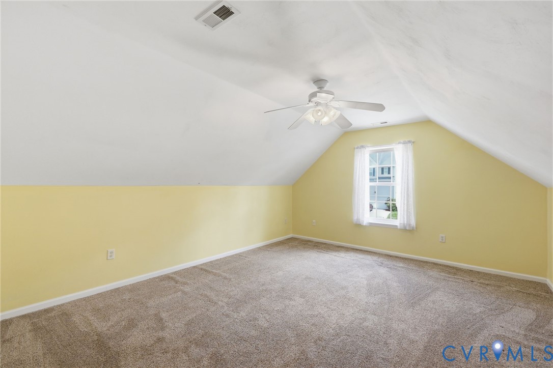 14719 Clover Ridge Lane Chesterfield, VA 23832 - Photo 31 of 36 Carpeted room featuring sloped ceilings, a window