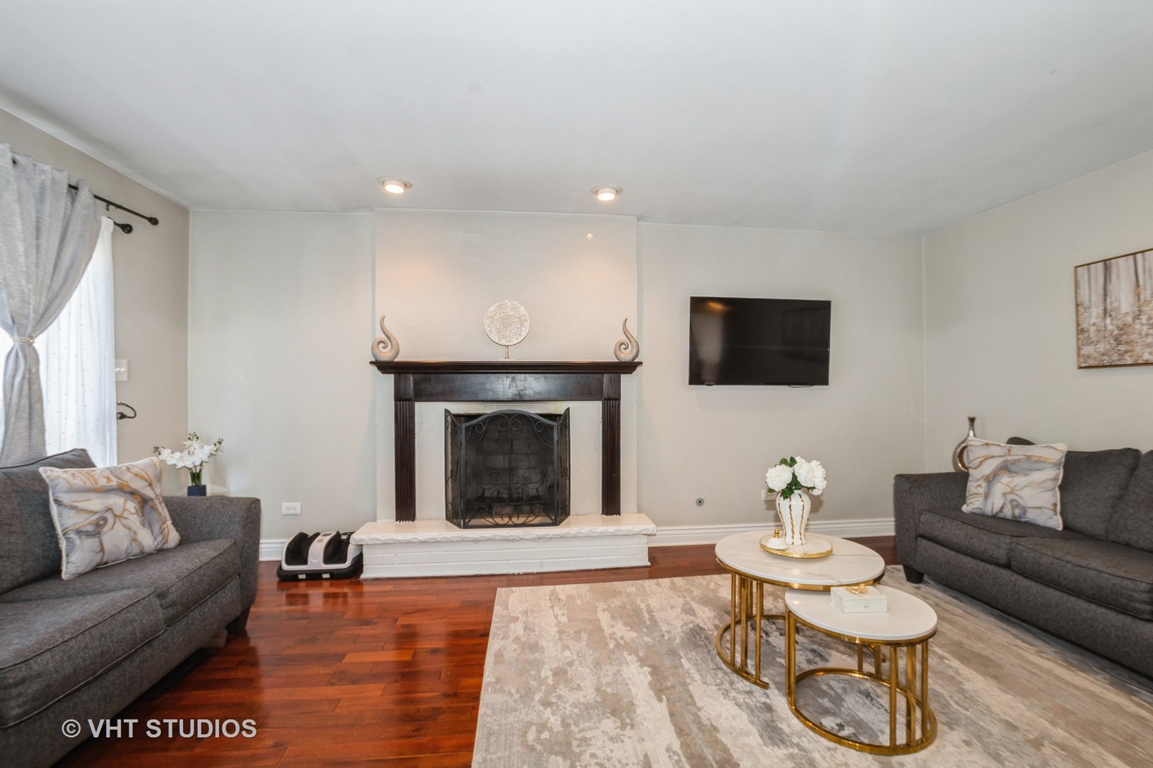 8036 Fawn Trail Justice, IL 60458 - Photo 7 of 16 a living room with furniture and a fireplace