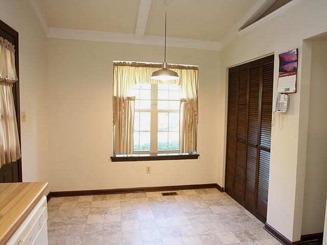 5408 Old Towne Road Raleigh, NC 27612 - Photo 8 of 18 a view of an empty room with a window