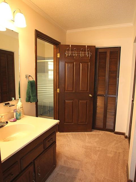 5408 Old Towne Road Raleigh, NC 27612 - Photo 10 of 18 a bathroom with a tub sink and shower