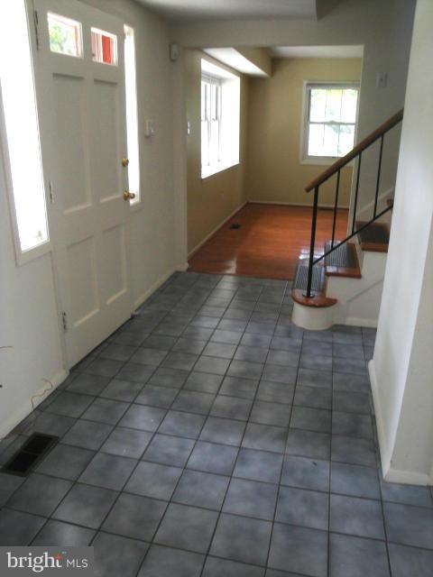 8908 Montpelier Drive Laurel, MD 20708 - Photo 12 of 23 Foyer with ceramic tile