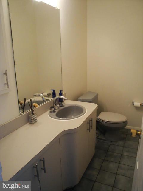 8908 Montpelier Drive Laurel, MD 20708 - Photo 13 of 23 Sleek, contemporary powder room