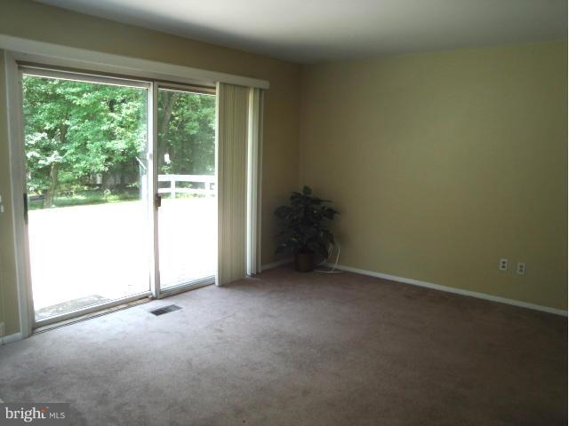 8908 Montpelier Drive Laurel, MD 20708 - Photo 8 of 23 2nd Family Room off kitchen w/sliders to patio