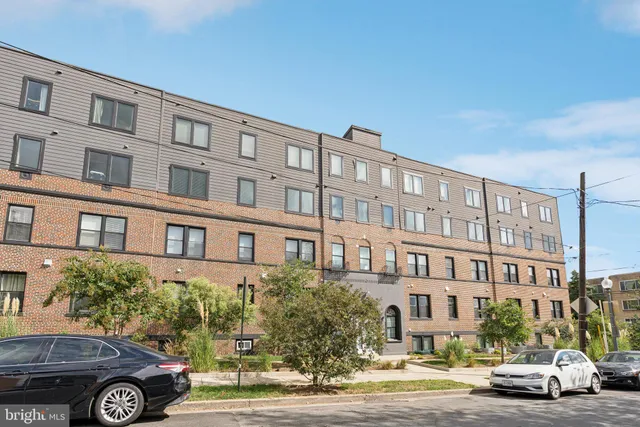 a car parked in front of a building