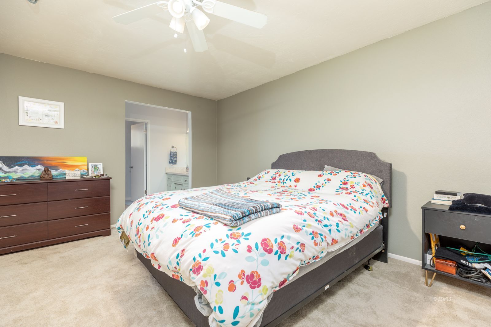 1012 Scott Street Ridgecrest, CA 93555 - Photo 17 of 31 a bedroom with a bed and a dresser