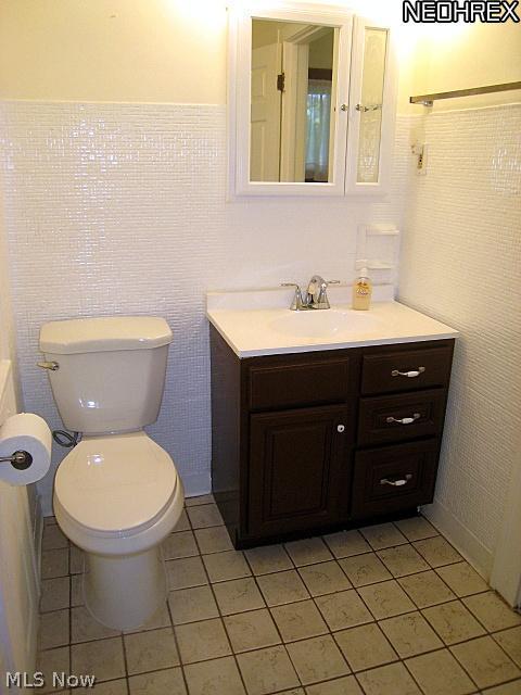 1051 Roanoke Road Cleveland, OH 44121 - Photo 12 of 25 Updated Bath w/Cermic Tile Floor and Culture Marble Sink Top