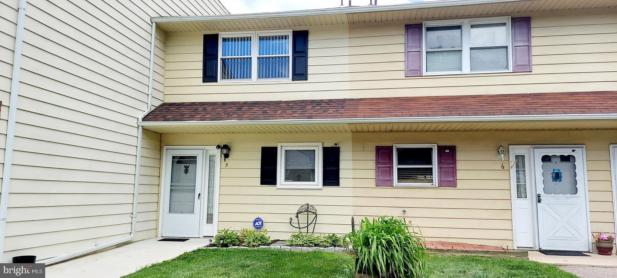 6 Via Cascata Drive Clementon, NJ 08021 - Photo 19 of 19 a view of brick house with many windows