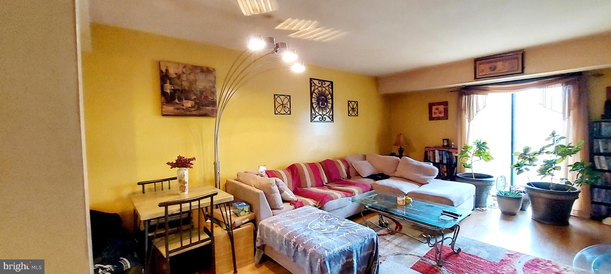 6 Via Cascata Drive Clementon, NJ 08021 - Photo 8 of 19 a living room with furniture and a potted plant