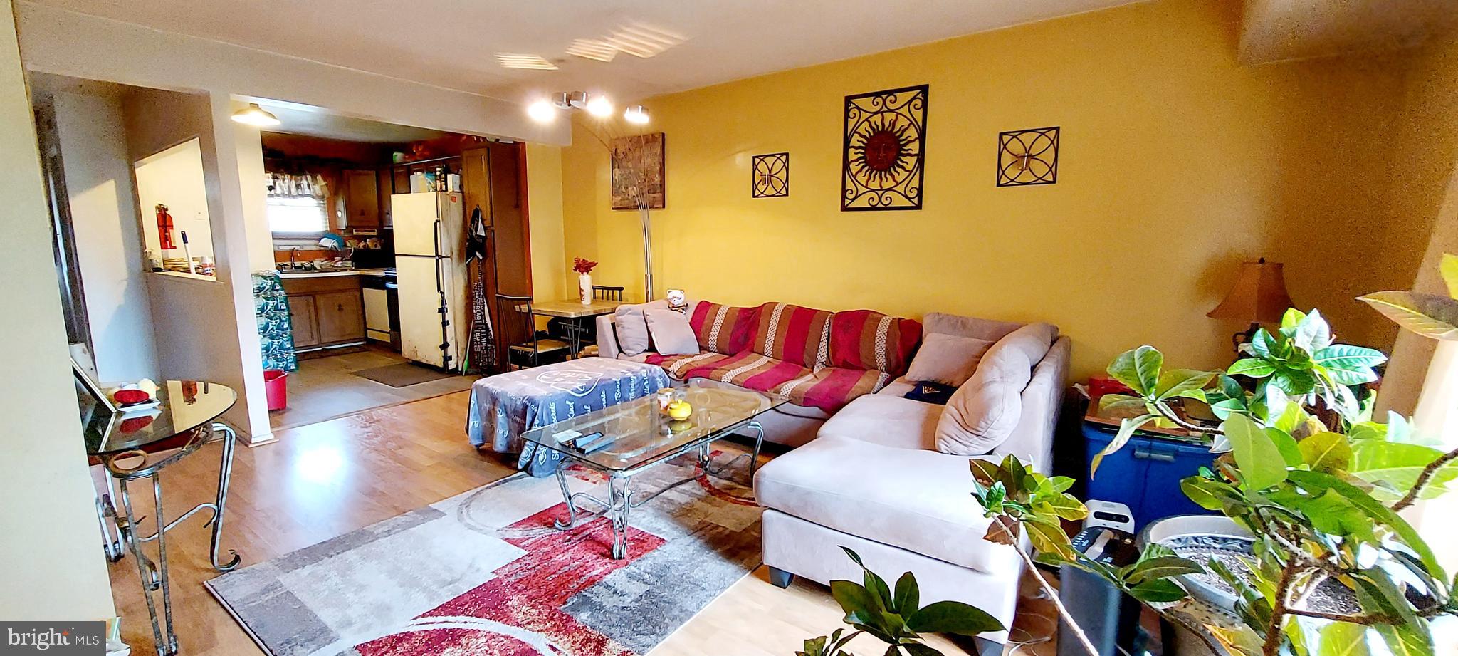 6 Via Cascata Drive Clementon, NJ 08021 - Photo 9 of 19 a living room with patio furniture and a flat screen tv