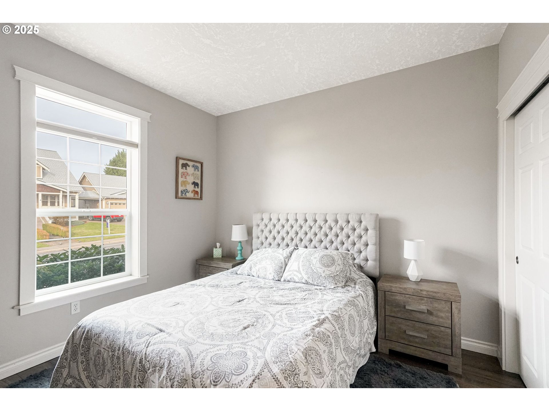 3208 54th Avenue Northeast Albany, OR 97321 - Photo 11 of 43 a bedroom with a bed and a window