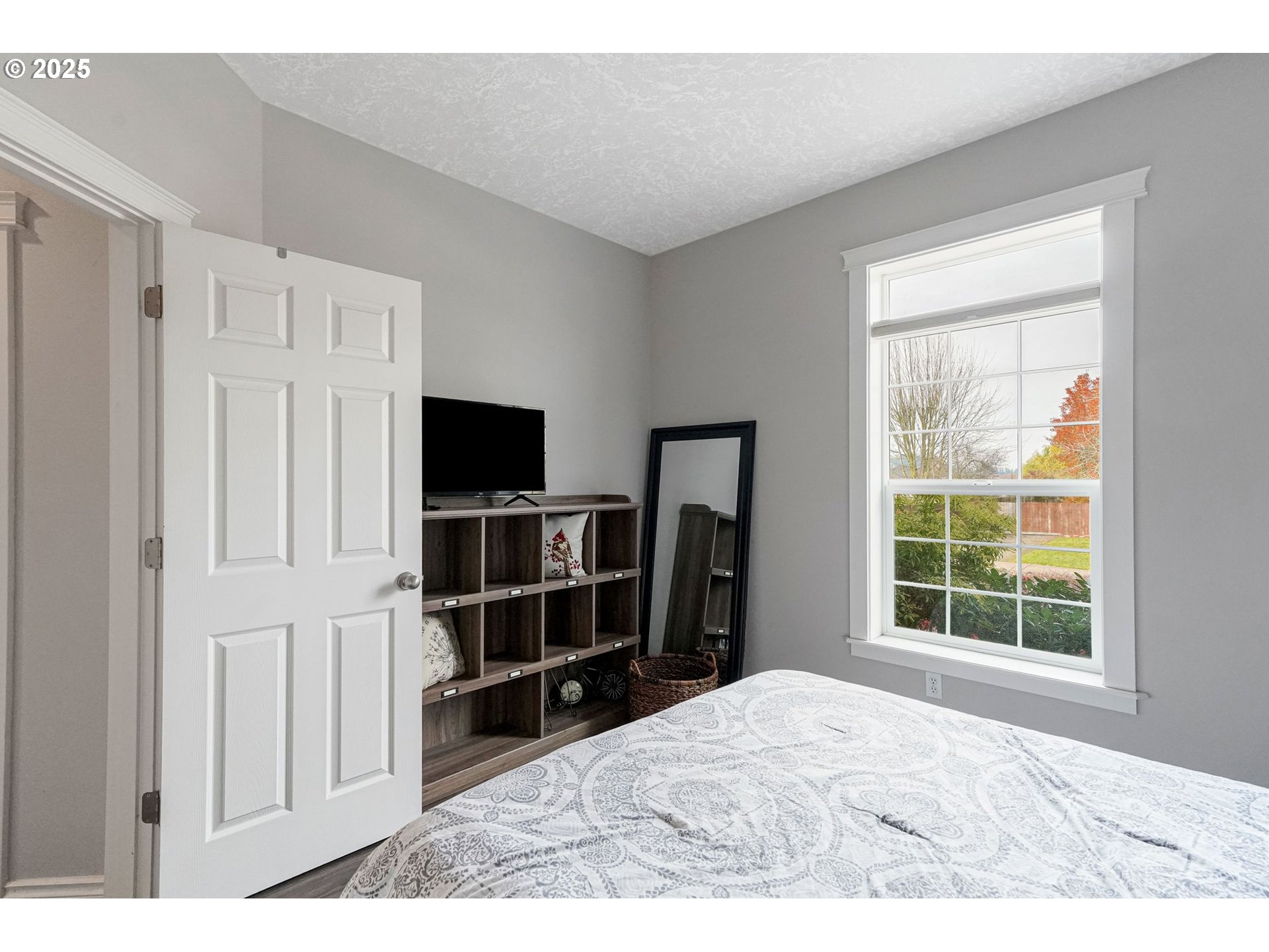 3208 54th Avenue Northeast Albany, OR 97321 - Photo 12 of 43 a view of a bedroom with furniture and window