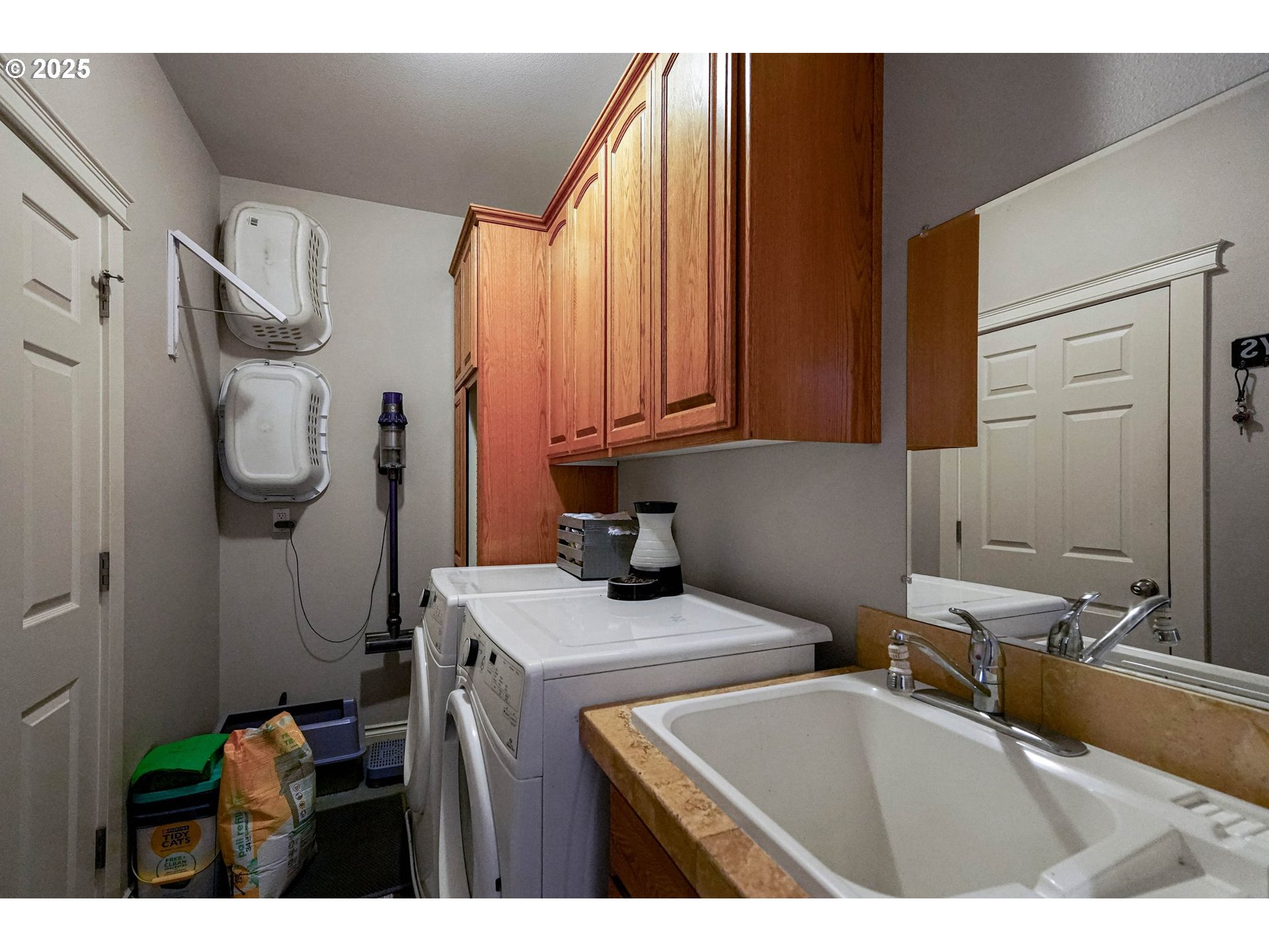 3208 54th Avenue Northeast Albany, OR 97321 - Photo 15 of 43 a bathroom with a sink a mirror and a shower