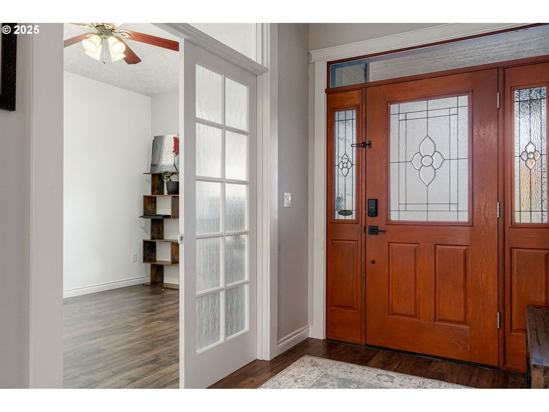 3208 54th Avenue Northeast Albany, OR 97321 - Photo 25 of 43 hallway with wooden floor and windows
