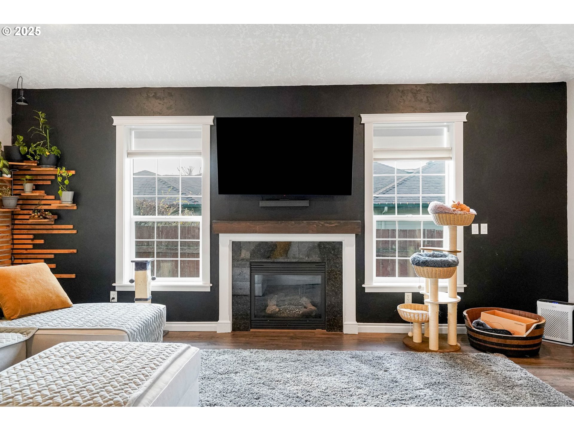 3208 54th Avenue Northeast Albany, OR 97321 - Photo 34 of 43 a bedroom with furniture and a fireplace