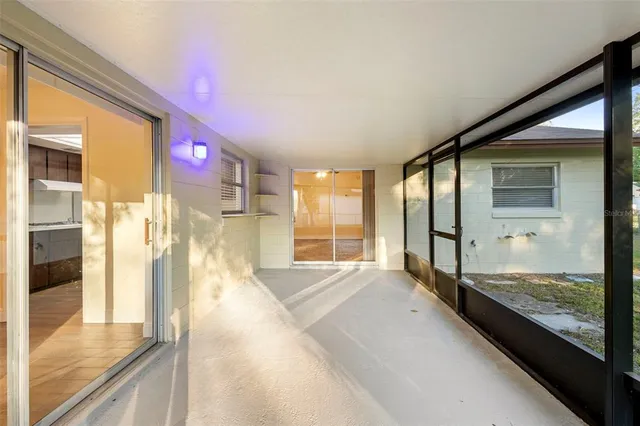 a large white room with large windows