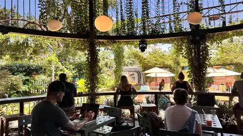 a street sign on a street next to a building