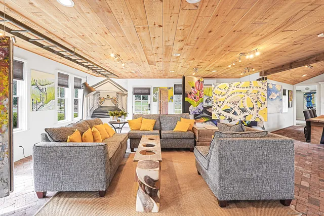 a kitchen with lots of appliances and cabinets