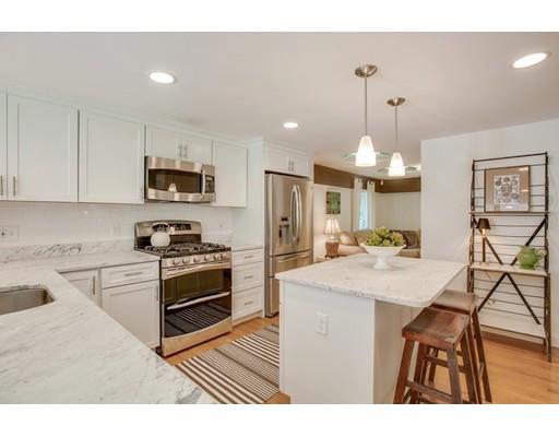 19 Warner Road Ipswich, MA 01938 - Photo 10 of 33 a kitchen with kitchen island granite countertop stainless steel appliances cabinets a sink and a counter top space