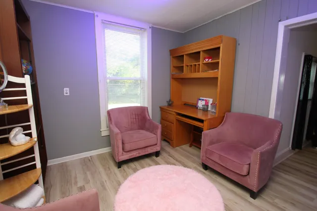 a room with furniture and a window