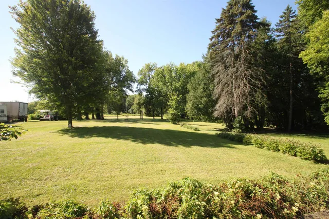 a view of swimming pool with an outdoor space and seating area