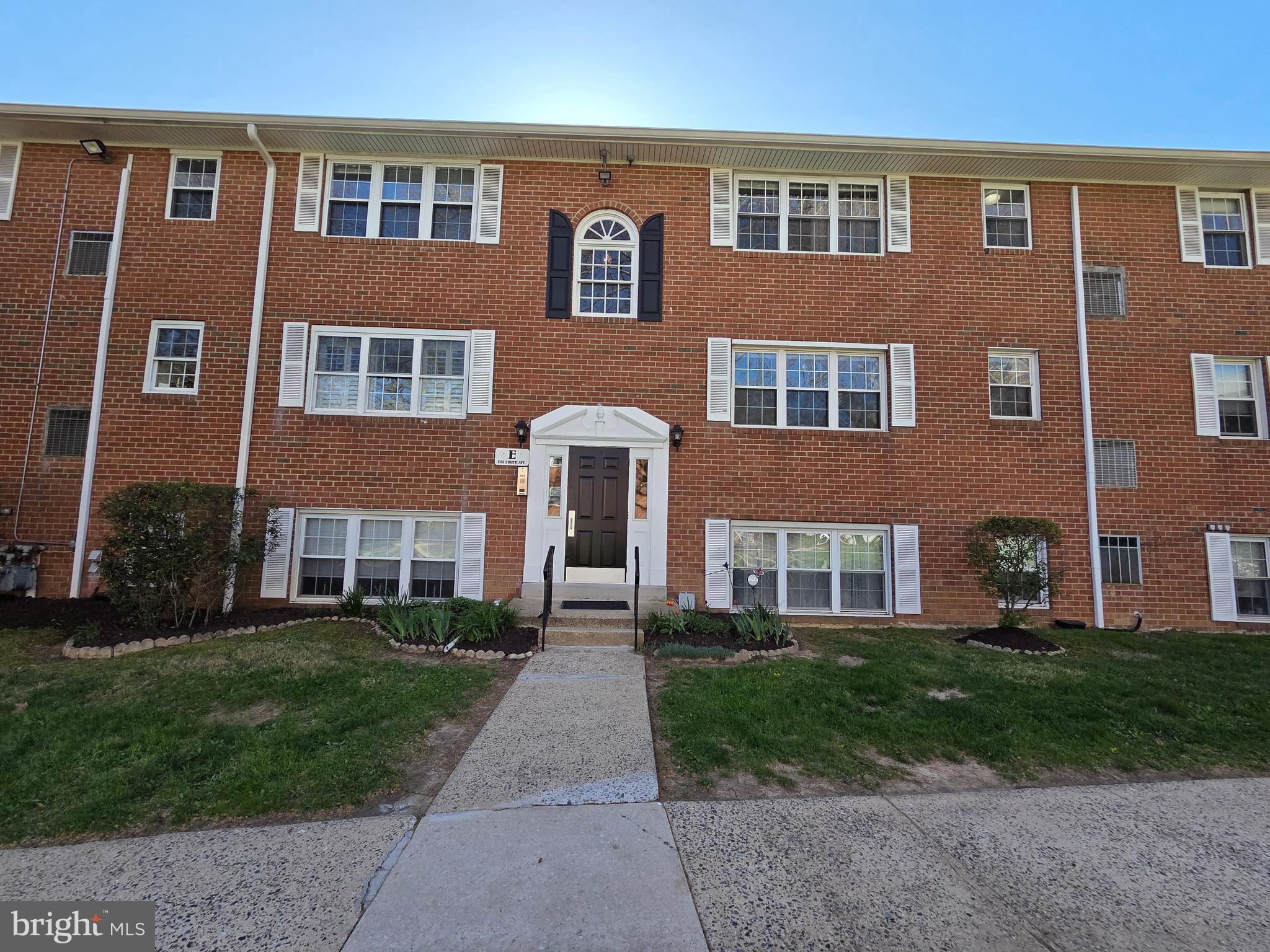 806 South Avenue, Unit E9 Secane, PA 19018 - Photo 4 of 17 a front view of a house with a yard