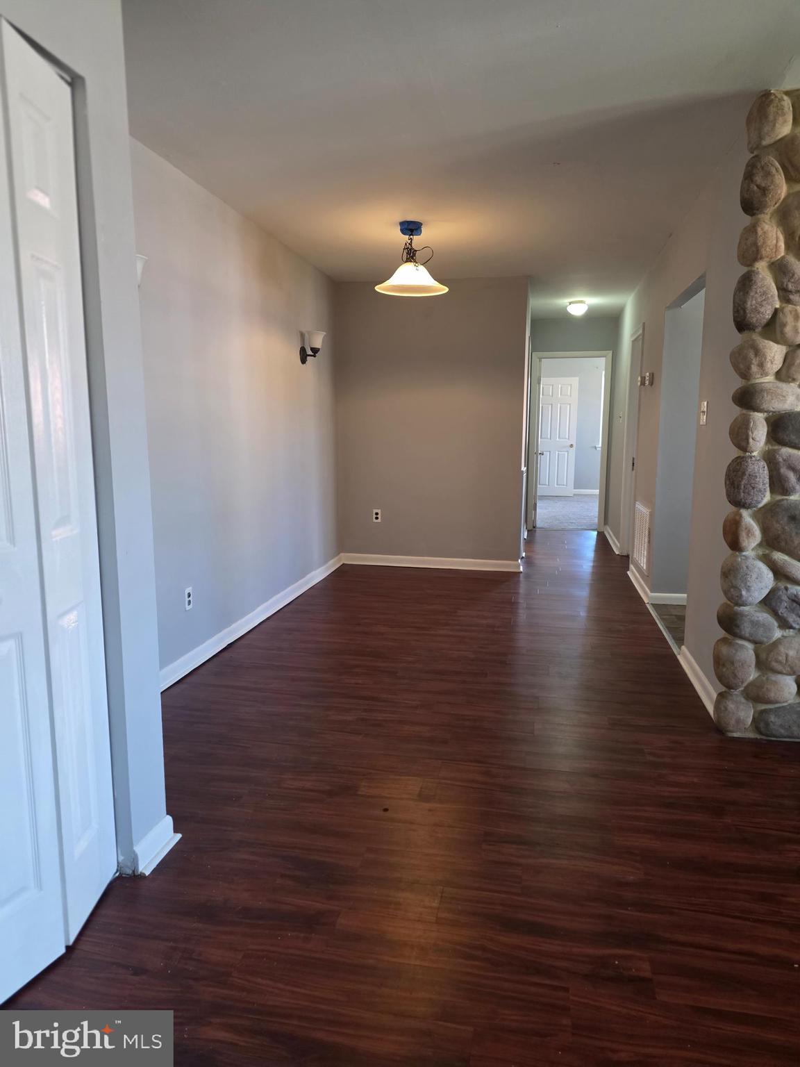 806 South Avenue, Unit E9 Secane, PA 19018 - Photo 9 of 17 wooden floor in an empty room with a window