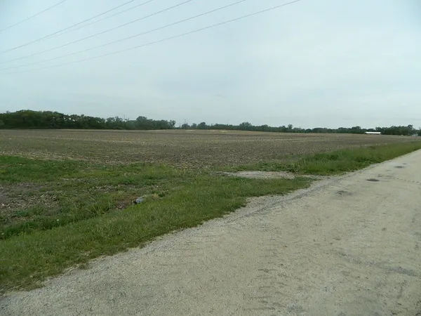 a view of a lake from a yard
