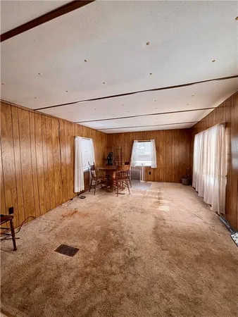 a view of a workspace with furniture