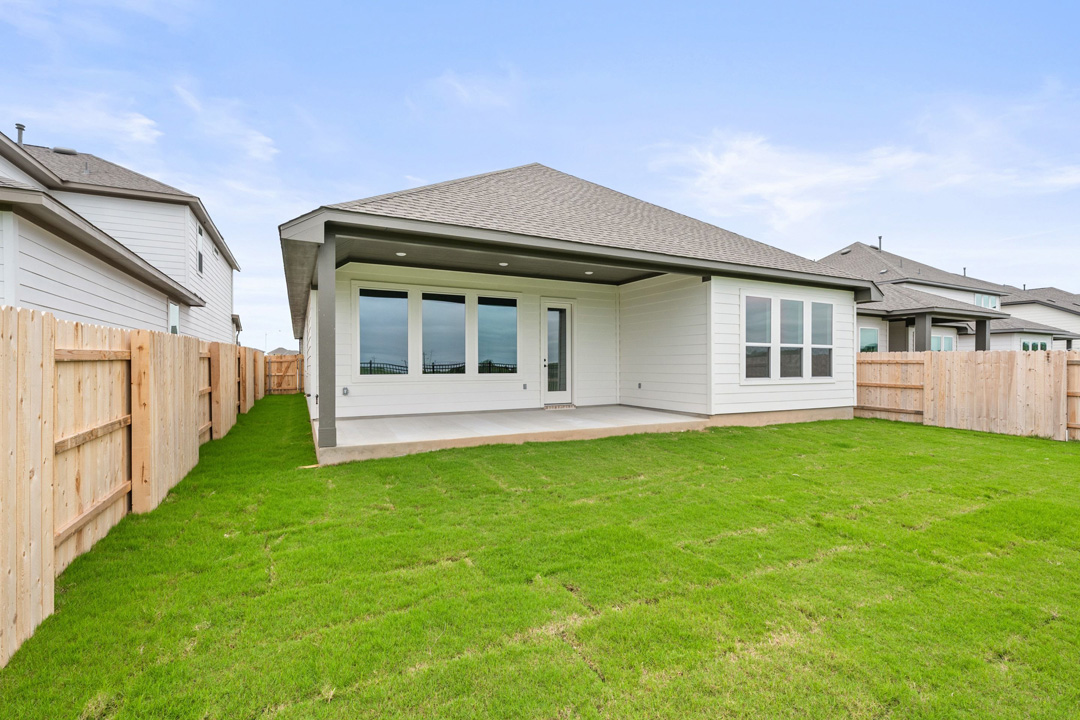 16201 Smithers Road Manor, TX 78653 - Photo 36 of 40 a house view with a garden space