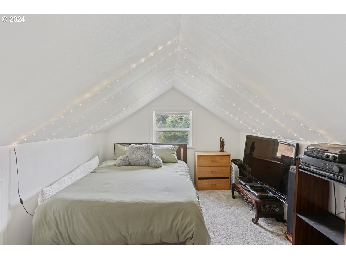 32997 Sykes Road St. Helens, OR 97051 - Photo 25 of 44 a bedroom with a bed and furniture