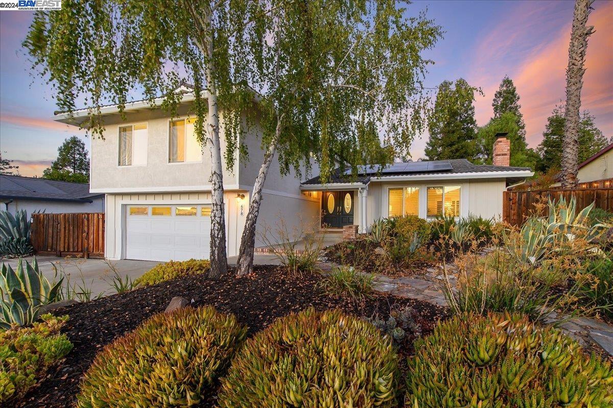 678 Sylvaner Drive Pleasanton, CA 94566 - Photo 1 of 1 a view of a house with a tree in the background