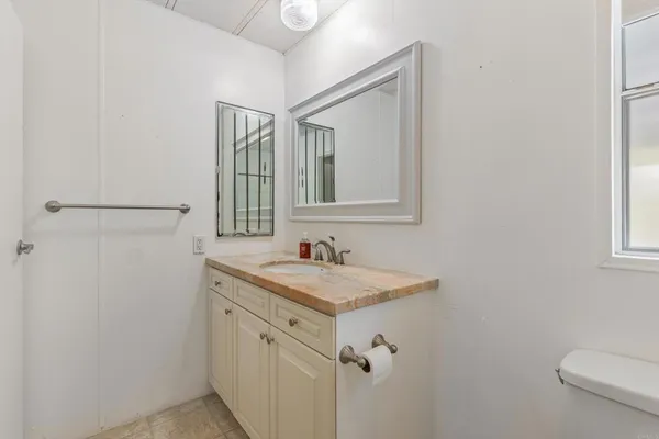 a bathroom with a sink and a toilet