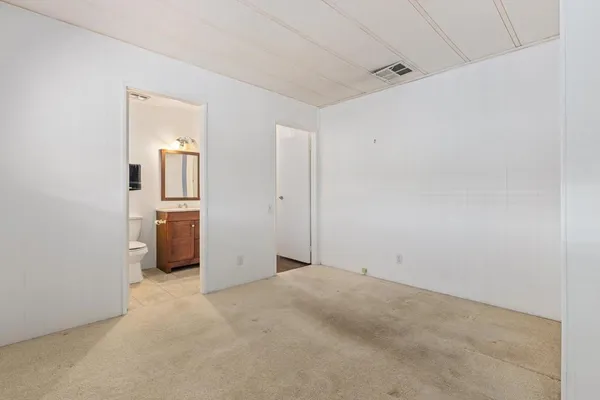 a view of a kitchen with a sink