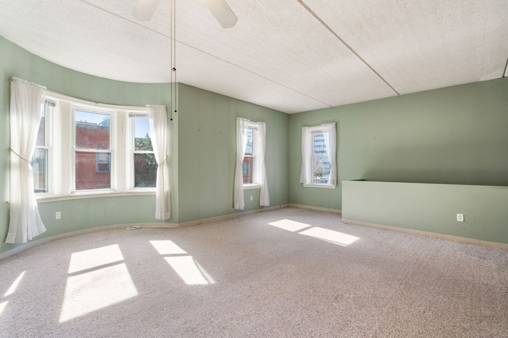 a view of a livingroom with a window