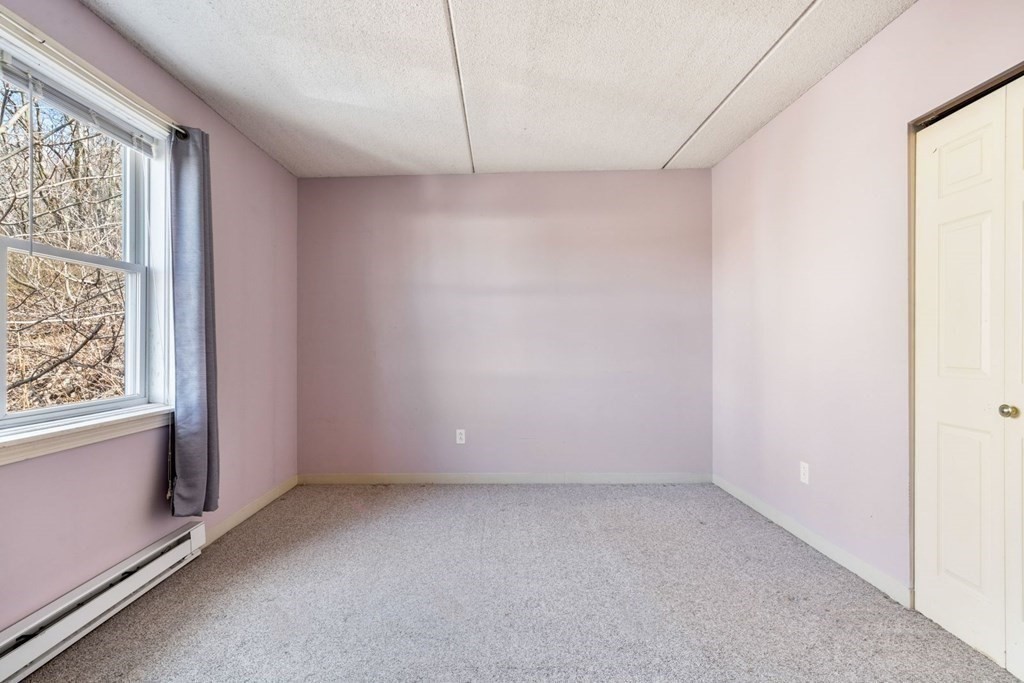 5 B Eileen Circle, Unit 11 Boston, MA 02130 - Photo 12 of 19 an empty room with windows