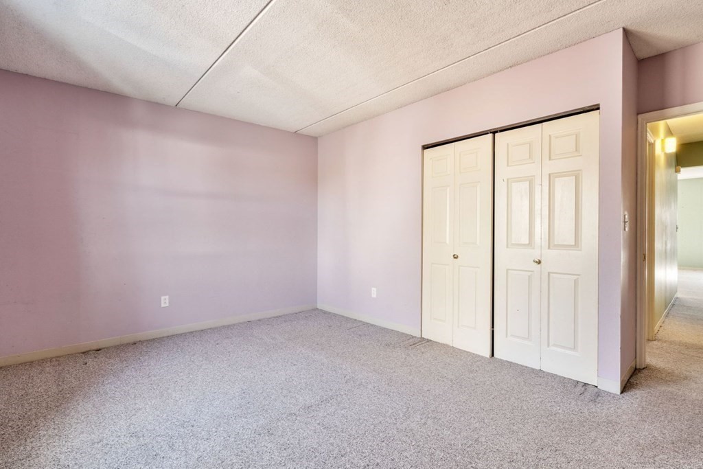 5 B Eileen Circle, Unit 11 Boston, MA 02130 - Photo 14 of 19 a view of an empty room with a window