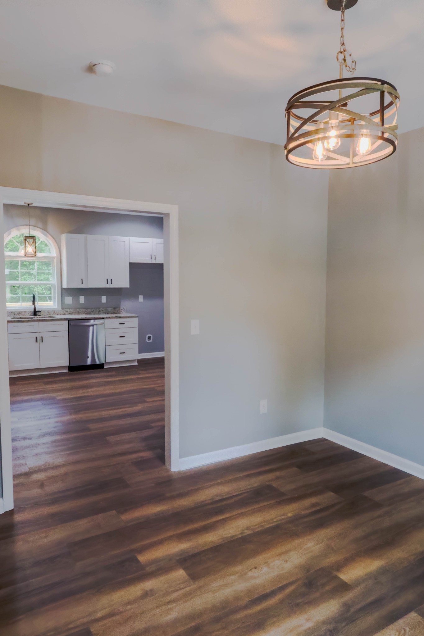 161 Vista Pointe Hohenwald, TN 38462 - Photo 13 of 43 a view of kitchen and kitchen with wooden floor